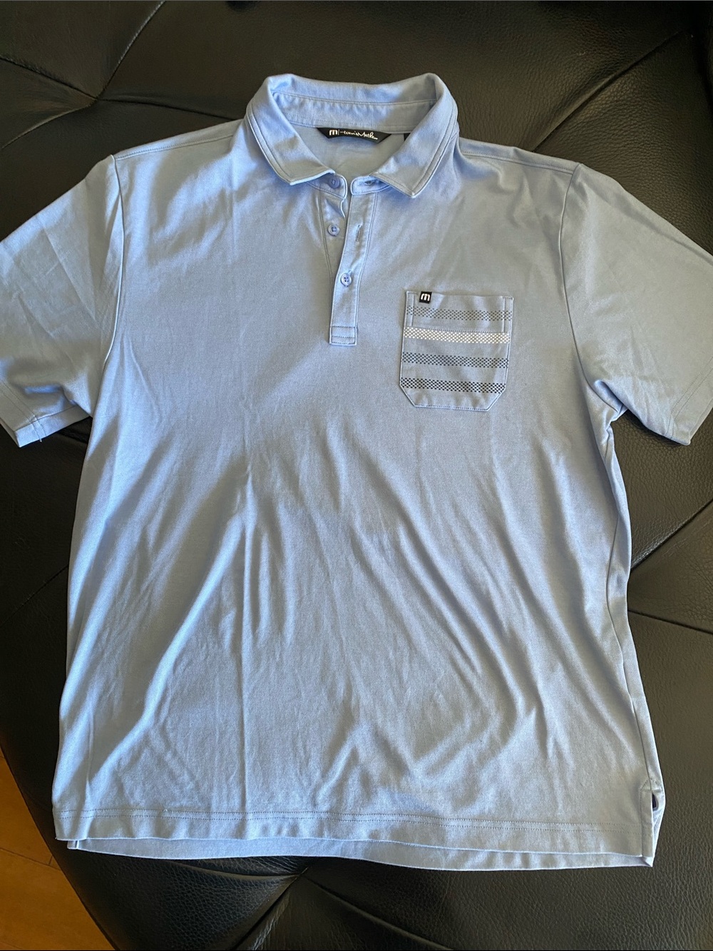 Travis Mathew Light Blue Polo with Patterned Chest Pocket